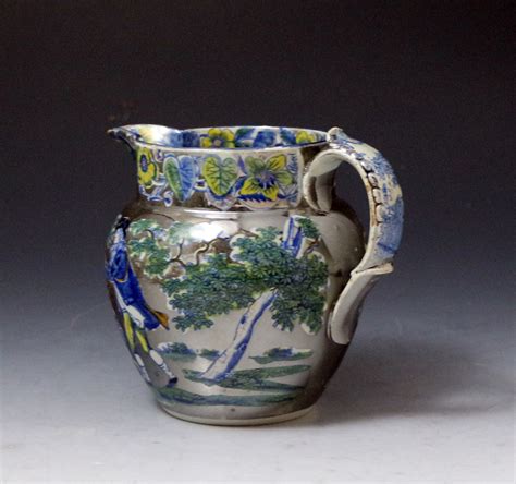 Antique pottery silver luster pitcher with underglaze polychrome ...