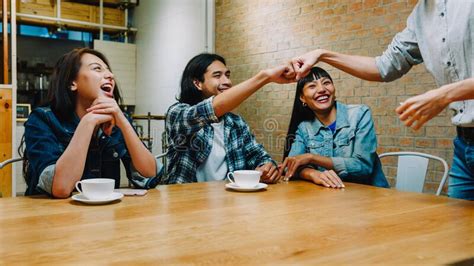 Group Of Happy Young Asia Friends Having Fun A Great Time And Laughing