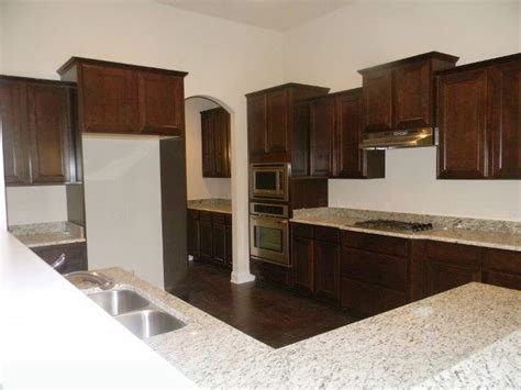 Avoid the stress of doing it yourself. The Newberry Kitchen with Landen Maple Umber Cabinets ...