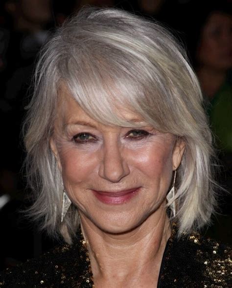 Helen Mirren With Her Silver White Hair In A Style That Touches The Collar