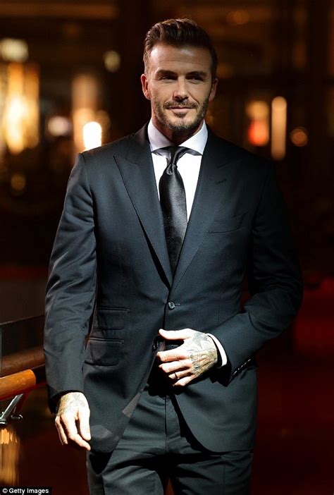 David Beckham Looks Effortlessly Suave In A Black Suit At Singapore