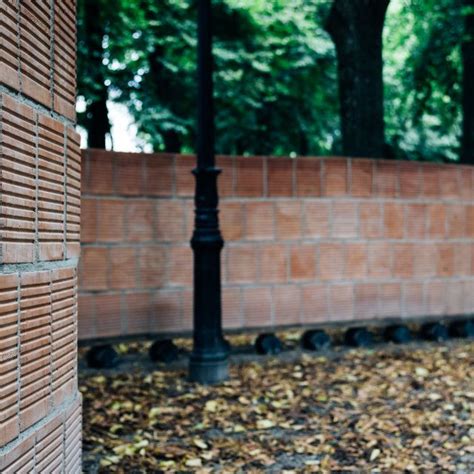 Curved Brick Wall In City Park Focus On Foregtround Space For On