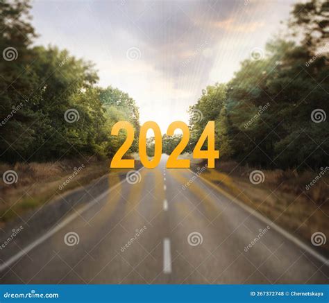Start Of New 2024 Year Asphalt Road Leading To Numbers Stock Photo