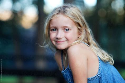 Outdoor Portrait Of Blonde Girl Wearing Denim Dress Del Colaborador