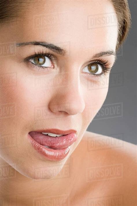 A Woman Licking Her Lips Stock Photo Dissolve