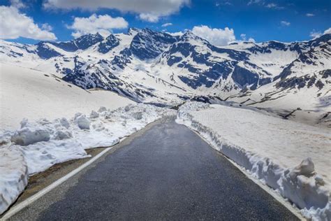 Alpine Mountain Road Between Snow At Springtime Gran Paradiso Alps Italy Stock Photo Image