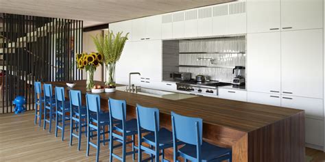 The crisp white cabinets and stainless steel appliances prove that retro style can be achieved without abandoning modern conveniences. 30 Modern Kitchen Ideas - Contemporary Kitchens