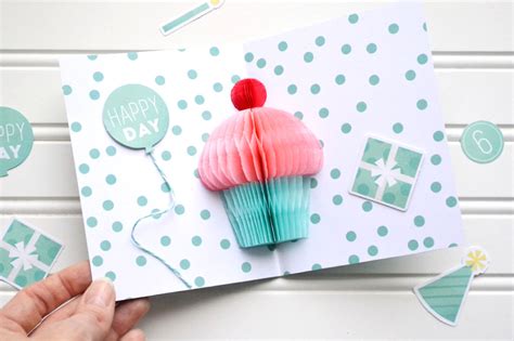 Delicious cupcake birthday card topped with chocolate buttercream and flower in a pink plaid cupcake liner. Aly Dosdall: pop-up cupcake birthday card | video tutorial