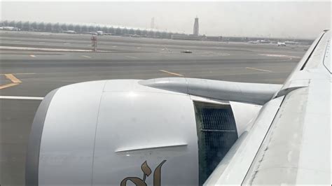 Emirates B777 300er Landing At Dubai Intl Airport Runway 12l Ek433