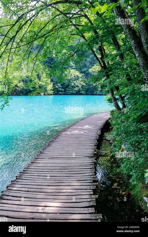 Wooden Walkways Beside The Turquoise Waters In Plitvice Lakes National