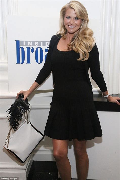 Christie Brinkley 59 Shows Off Her Youthful Side As She Lights Up
