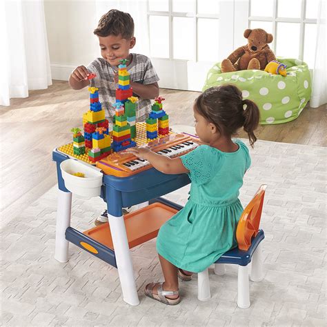 The Music Playing And Building Activity Table Hammacher Schlemmer