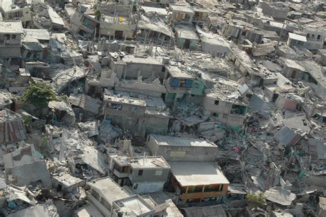Haiti Disaster Haiti Earthquake Pictures Of 2010 Showing Death Toll