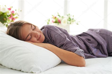 Close Up Of Beautiful Woman In Satin Pajamas Sleeping Peacefully