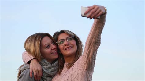 Two Simpering Girls Taking Selfie Photo Stock Footage Sbv 306734656