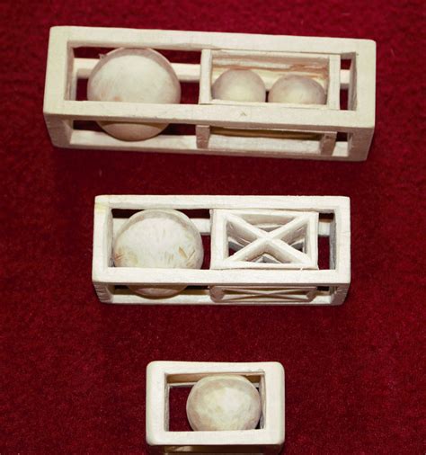 Ball N Cage And Two Ball In Cage Within Sliding Cages Wood Carving