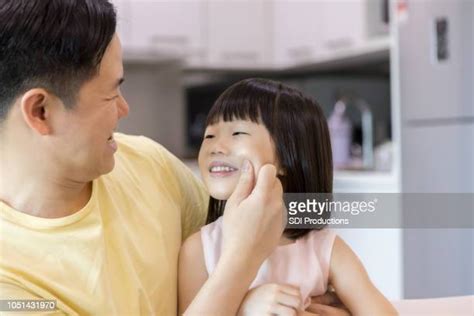Pinch Cheeks Kid Photos And Premium High Res Pictures Getty Images