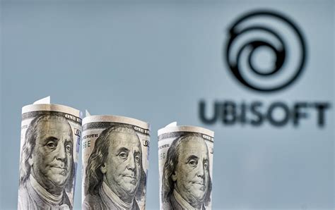 Ubisoft Entertainment Video Game Company Logo And Us Dollar Bills