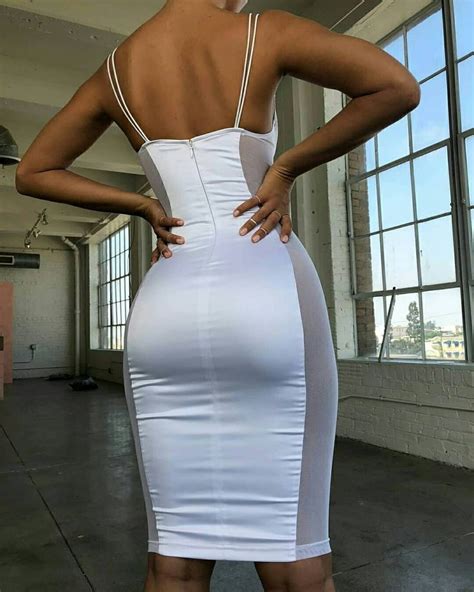 you re a h o t topic 💅 ⁣⁣the sheer for you midi dress in white also available in gold