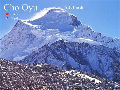 There Is A Mountain With Snow On It And The Words Cho Oyi Written In Red