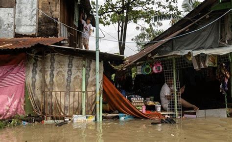 rain floods in philippines leave 32 dead others missing