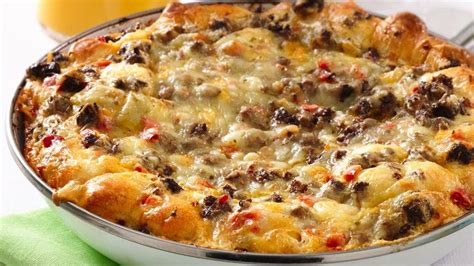 Sausage, bacon & veggies nestled in a fluffy, cheesy egg bake. Cheesy Southwest Egg Bake recipe from Pillsbury.com