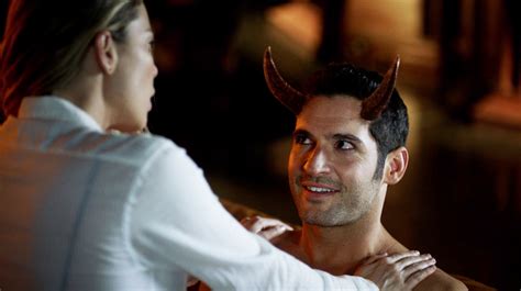 A Man With Horns On His Head Is Talking To A Woman In A White Shirt