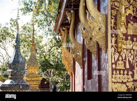 A towering architectural structure, with its facade adorned in golden