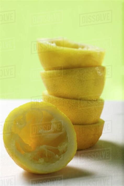 Squeezed Lemons In A Pile Stock Photo Dissolve
