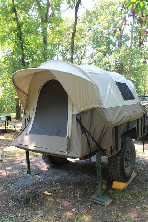 Maybe even add t connectors to the junctions above the tail lights to put a two foot or so extension there to carry back the roofline of the tent? Army trailer with full sized truck bed tent on it | Truck bed tent, Truck tent, Tent