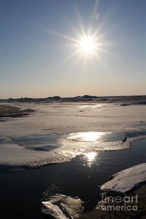 Sun Shining On Melting Ice Photograph By Christopher Purcell
