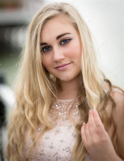 Beautiful Blond Teenage Girl With Blue Eyes ⬇ Stock Photo
