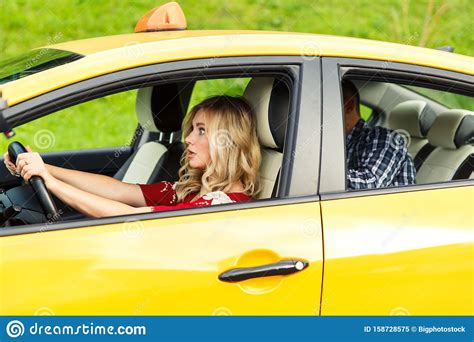 Photo On Side Of Woman Driver Sitting In Yellow Taxi On Summer Stock Image Image Of Outdoors
