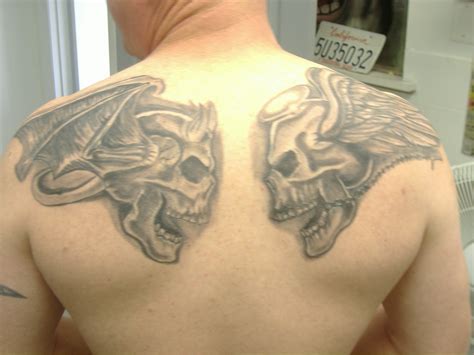 Evil tattoos, while also giving readers some amazingly unique artwork to look at, we have put together the list below. Good And Evil Skull Tattoos Evil vs good - Tattoo Maze