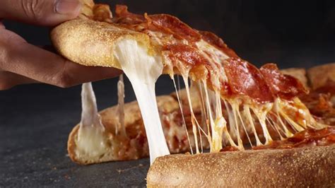 This Popular Pizza Chain Just Launched A New Epic Stuffed Crust