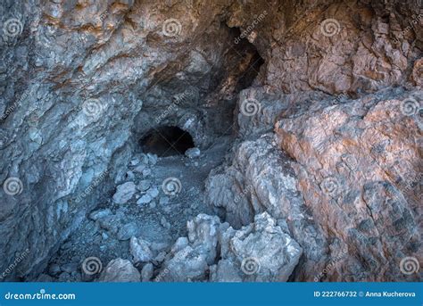 Cave Entrance Dark Tunnel Leading Under A Mountain Stock Photo Image