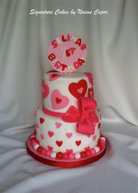 Cut the circle cake in half evenly. Valentine themed first birthday cake - cake by - CakesDecor