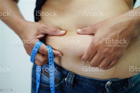 Overweight Asian Woman Use Hand To Squeeze Fat Belly Big Size