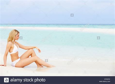Woman Sunbathing On Beautiful Beach Holiday Stock Photo Alamy