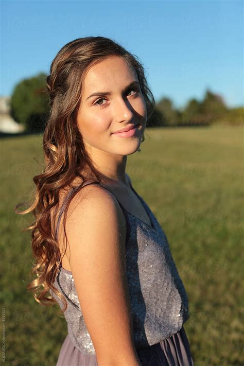 A Pretty Teenage Girl Dresses Up For A School Dance By Stocksy