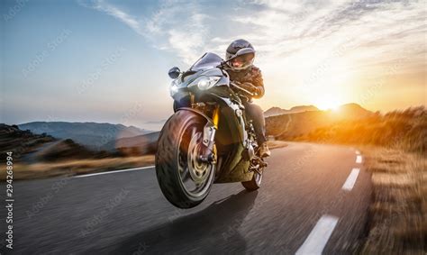 fast motorbike on the coastal road riding having fun driving the empty highway on a motorcycle