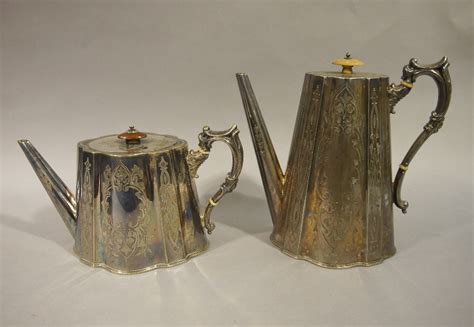 A Victorian Silver Plated Melon Shaped Teapot Together With A Coffee