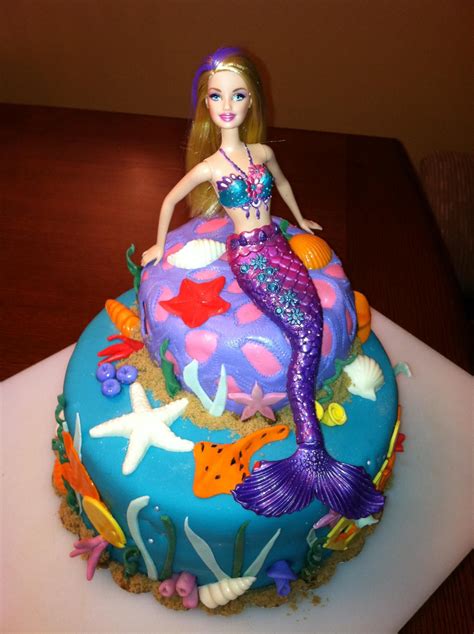 Order a barbie cake online from yummycake and select your best barbie dolls cake design as per your budget and gathering. Barbie Mermaid Cake — Seashells /Ocean/Beach | Mermaid birthday cakes, Mermaid cakes, Barbie ...