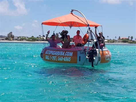 Floating The Sea In An Aqua Donut With Octopus Aruba Visit Aruba