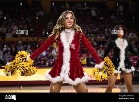 arizona state spirit squad performs at half time during an ncaa basketball game between the