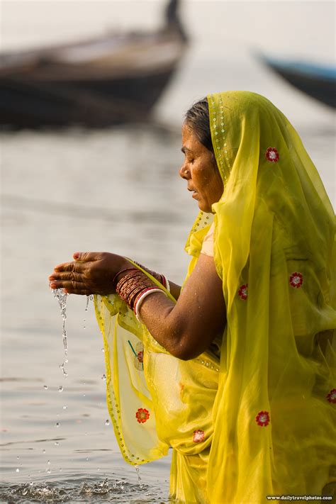 Dawn Dip Hindu Woman Bathing In The Ganges River In Varanasi