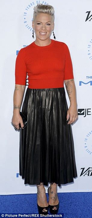 Pink Opts For Ladylike Glamour In A Pleated Leather Skirt