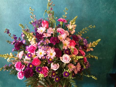 We provide the finest in flowers, blooming & green plants, hanging baskets and gifts. Funeral Flowers