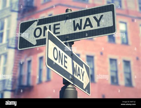One Way Road Sign Against Buildingsillustration Stock Photo Alamy
