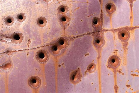 Rusty Bullet Hole Backgrounds Stock Photos Pictures And Royalty Free